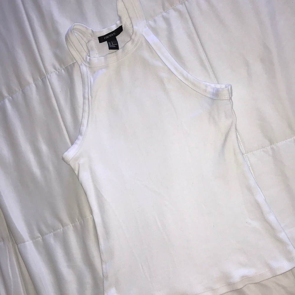 Sleeveless White Shirt.
